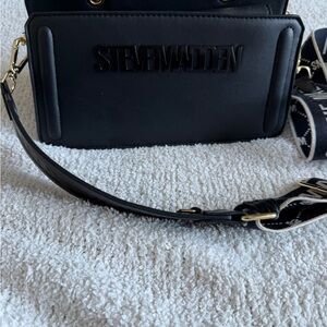 Steve Madden Black Crossbody Bag with Branded Strap and Gold Hardware